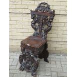 An Italian carved walnut sgabello hall chair, 19th century,