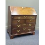 A George III mahogany bureau, the fully fitted interior over one long drawer / two short and two