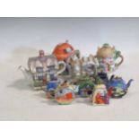 A large collection of modern minature decorative teapots (quantity)