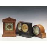 Four various mantel clocks, including a black marble case clock