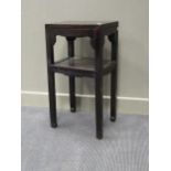 A Chinese two tier hardwood occasional table, 80 x 42 x 31cm