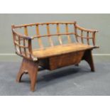 A 19th century European oak slatted bench seat with hinger seat compartment 115cm wide