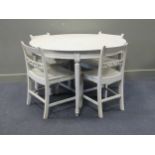A French circular grey painted table and four Regency design painted chairs. Table 79 x 119cm