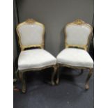 Pair of French gilt side chairs