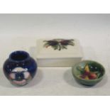 Moorcroft: a small vase, a bowl and a lidded box (3)