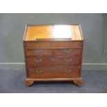 A George III oak bureau, 98 x 87 x 49cm