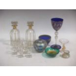 A Norman Stuart iridescent glass vase, a good Venetian gilded blue wine glass, a pair of gilt