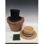 A crocheted cloth, vintage lady's dress and coat, top hat in leather box, Leys School boater,