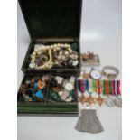 A jewellery box containing a Second World war campaign medal set comprising two each of 39/45