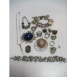 A quantity of silver and costume jewellery