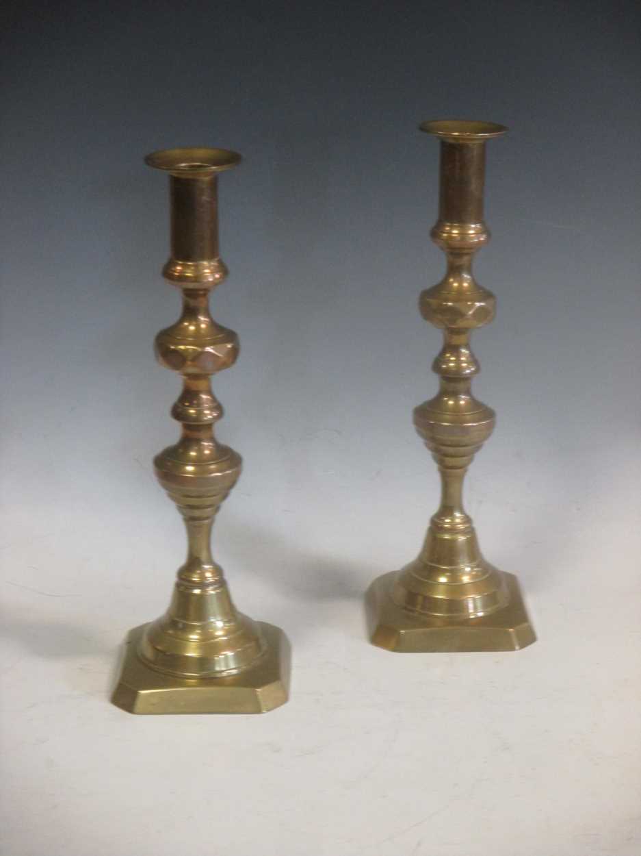 A pair of brass candlesticks 30cm high (2)