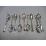 A set of 9 Britannia silver teaspoons, 3.7ozt