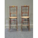 A pair of 19th century correction chairs