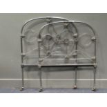 A pair of cast metal single beds (2)