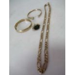 A hallmarked 9ct gold chain together with a hallmarked 9ct gold bangle, a bangle tested as 9ct