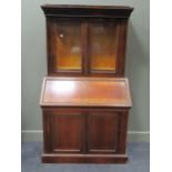 A 19th century Continental rosewood and brass inlaid bureau bookcase of small proportions, the upper