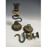 A George III damaged ivory tea caddy, and pair of snake stem gilt brass candlesticks 21cm high (