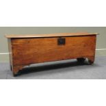 An 18th century elm plank coffer, 135cms.