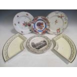 Three 19th century Continental creamware plates, two Wedgwood creamware side plates, two Derby