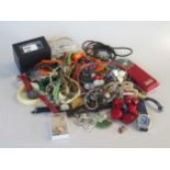 A large quantity of costume jewellery, beads and watches