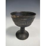 A Greek antiquity black glazed pedestal bowl, 15cm high