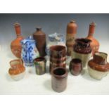 Two 19th century terracotta water bottles, probably Wedgwood; various 19th century jugs etc