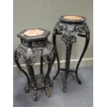 Two marble inset Chinese hardwood urn stands, tallest 94cm high