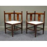 A Pair of Arts and Crafts inlaid mahogany corner chairs
