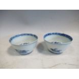 A pair of 18th century Chinese blue and white teabowls