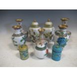 Two pairs of cloisonne enamel vases, pair of lidded jars, nesting cannisters, etc