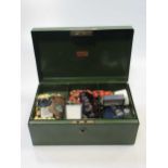 A quantity of costume jewellery to include a copper necklace, beads, a sovereign case, an enamel