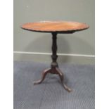 A 19th century mahogany tripod table 67cm high, 66cm diameter