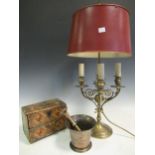 A brass bouillotte lamp with tole ware shade, a brass pestle & mortar and a Nepoleonic prisoner of