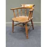 A smokers bow elbow chair
