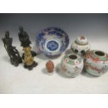 Three ginger jars, a Japanese bowl, 3 Oriental figural carvings, a collection of red and green