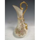 A Royal Worcester ewer, printed and painted with flowers