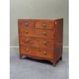 An early 19th century mahogany and inlaid chest of two short over three long drawers 105 x 99 x