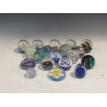 A collection of mostly Caithness and Selkirk glass paperweights (19)