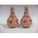 A pair of 19th century Copeland Spode bottle vases, the burnt orange ground bodies decorated with