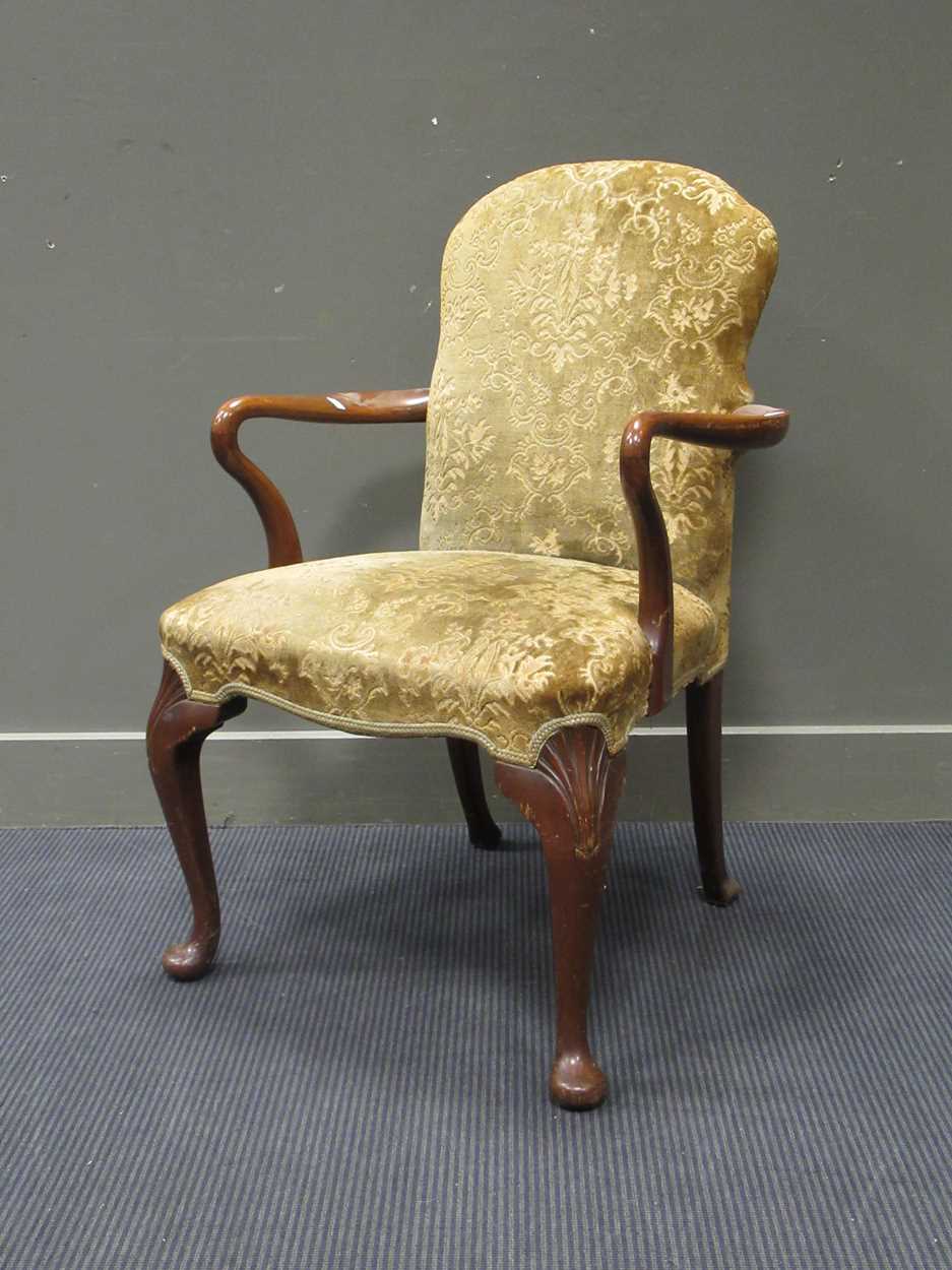 A George I style walnut armchair, with cut velvet upholstery, shepherd's crook arms, on cabriole