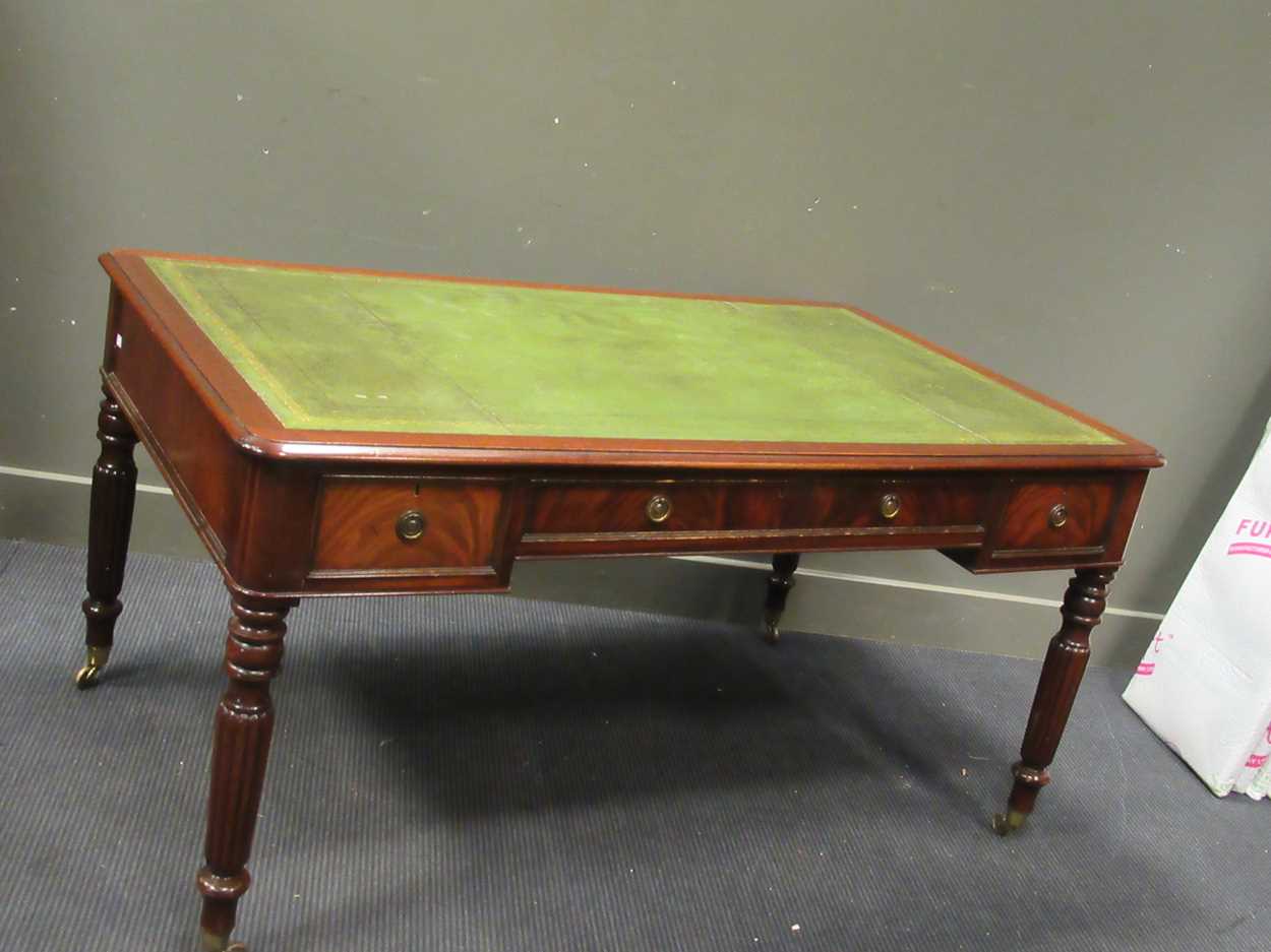 A Victorian style mahogany writing table with lined top 75 x 151 x 90cm