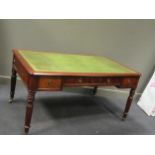 A Victorian style mahogany writing table with lined top 75 x 151 x 90cm