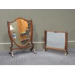 A Edwardian mahogany and line inlaid sheild shaped swing mirror 67cm high and 48cm wide together