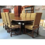 A modern oak oval top drop flap dining table in the continental style, 208 x 157cms, and a set of