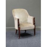 A Regency mahogany armchair on later ceramic castors