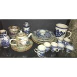 Chinese and other porcelain: cups, plates, bowls, a teapot, jug, repaired large mug, etc