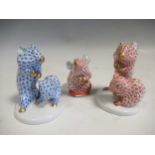 Two Herend red fishnet models of mice; a Herend blue fishnet model of two mice (3)