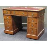 A late 19th century mahogany pedestal desk, leather inset top, on plinth base, 107cm wide approx