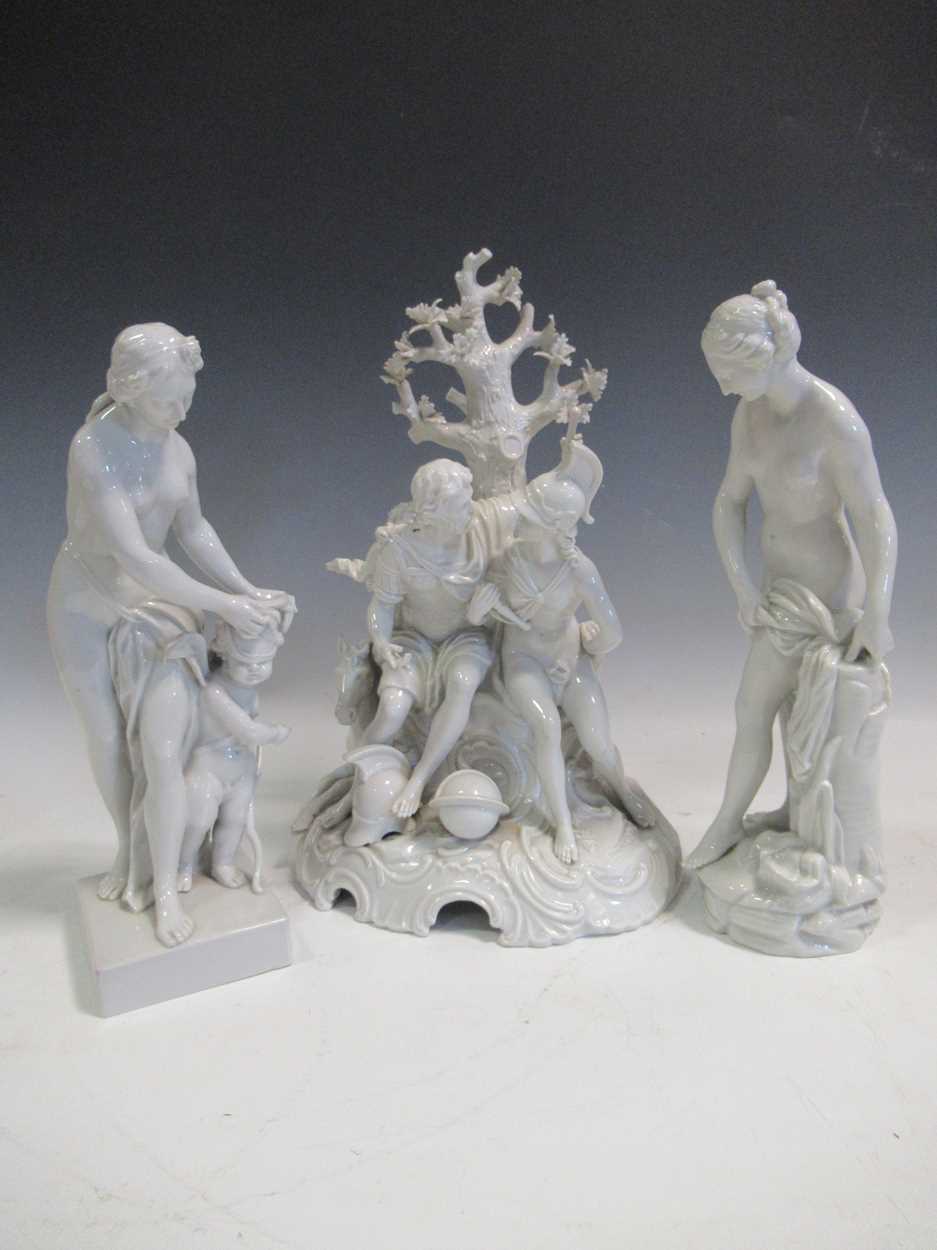 A 20th century German centrepiece with classical figures and two other figures all after the