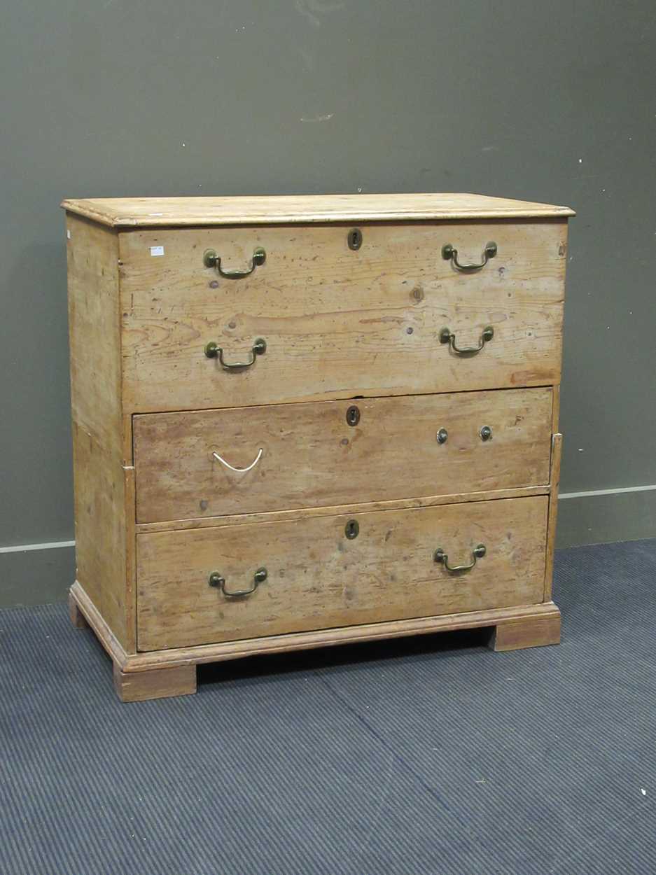 A 19th century pine chest with hinged top and drawers under 96 x 98 x 50cm